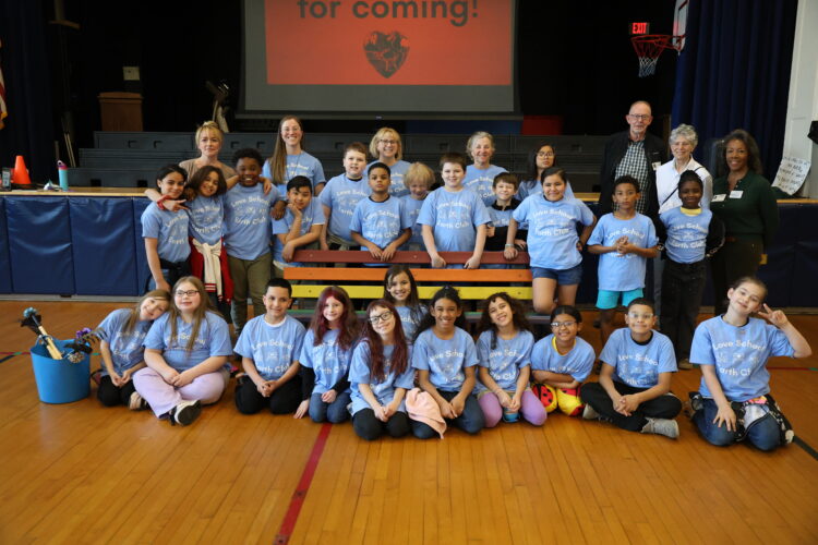 Caps To Connection: Love Elementary Dedicates “Buddy Bench” On Earth Day